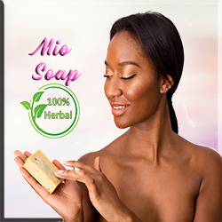 beautiful african american woman holding soap